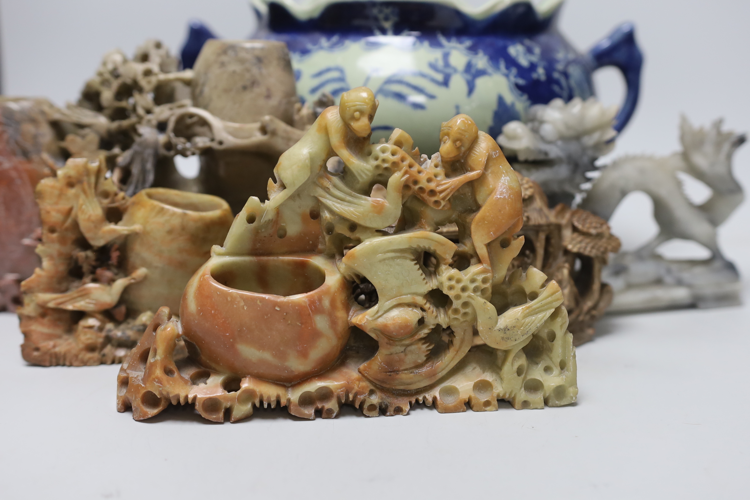 Five Chinese soapstone carvings and a two handled pot
